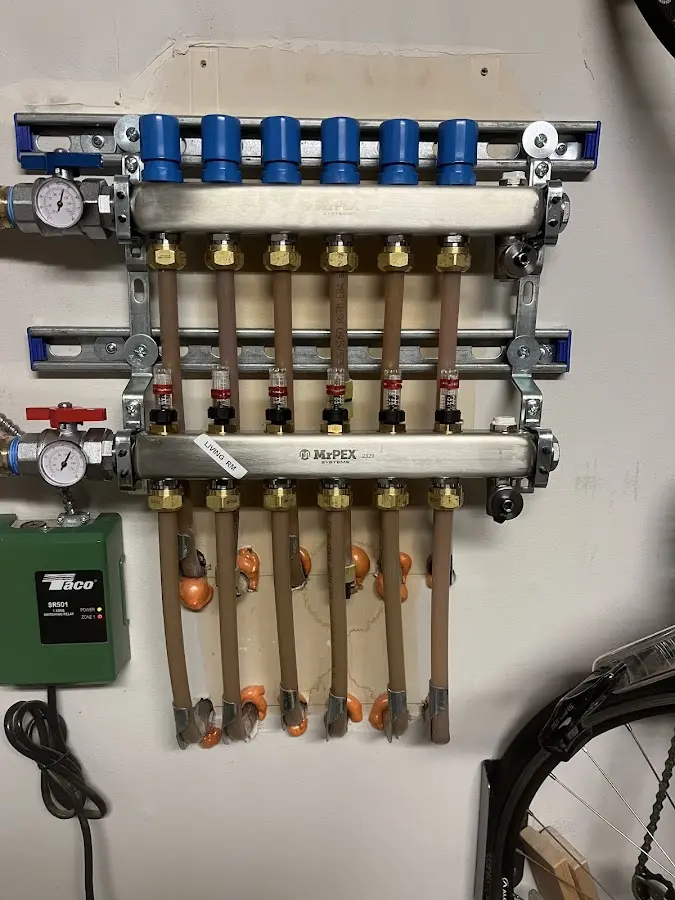 Plumber performing Gas Leak Detection at a residential property in Fridley